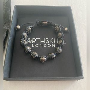 NORTHSKULL LONDON UNISEX GUNMETAL BRACELET WITH SKULLS